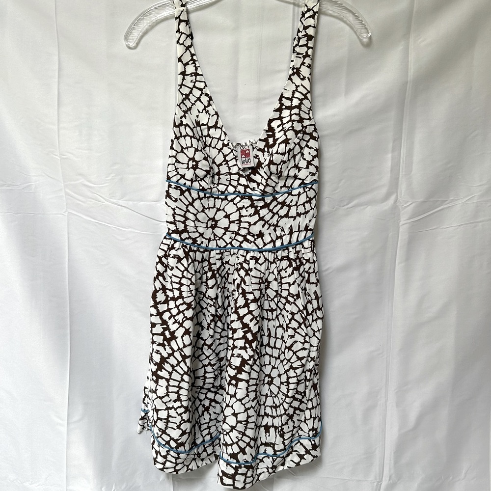 White mini sundress with brown pattern and aqua trim. Sz XS